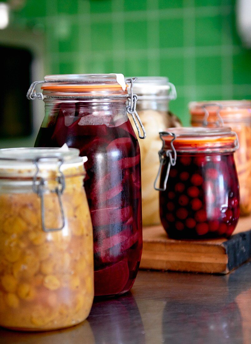 Preserving jars of various stewed fruits