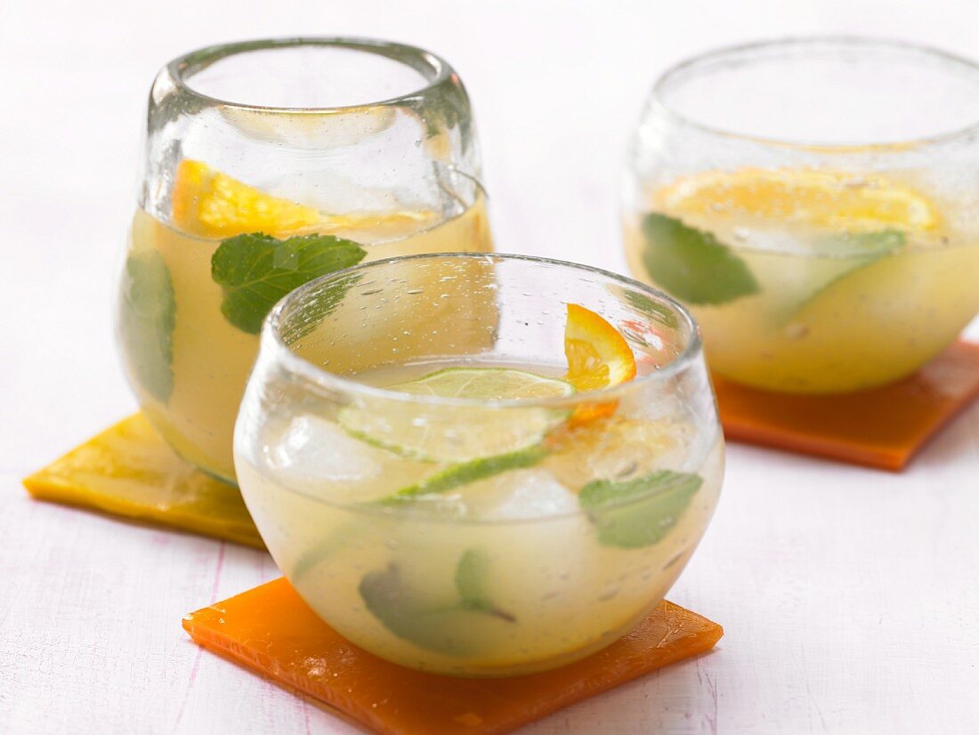 Ginger, lemon and orange drinks with mint
