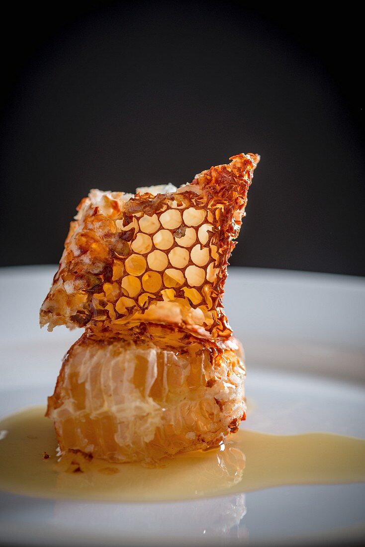 A honeycomb on a white plate