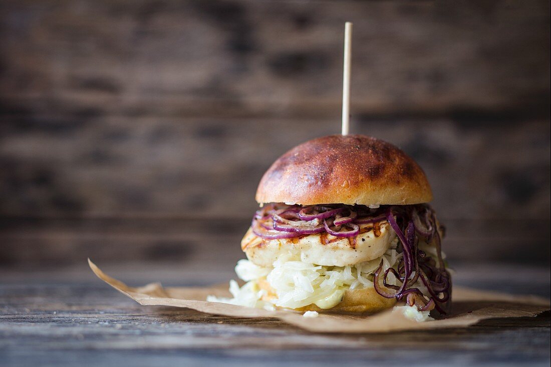 A burger with halloumi and cabbage