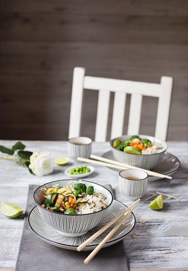 Basmati rice with vegetables on grey background