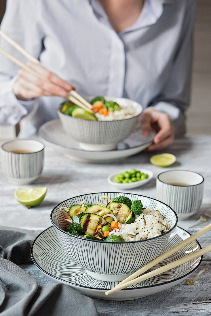 Basmati rice with vegetables on grey background