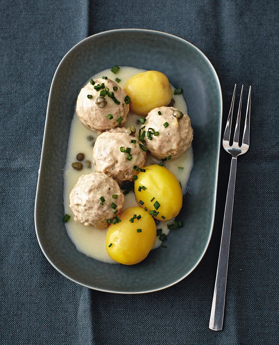 'Königsberger Klopse', meatballs in a white sauce with capers, served with boiled potatoes