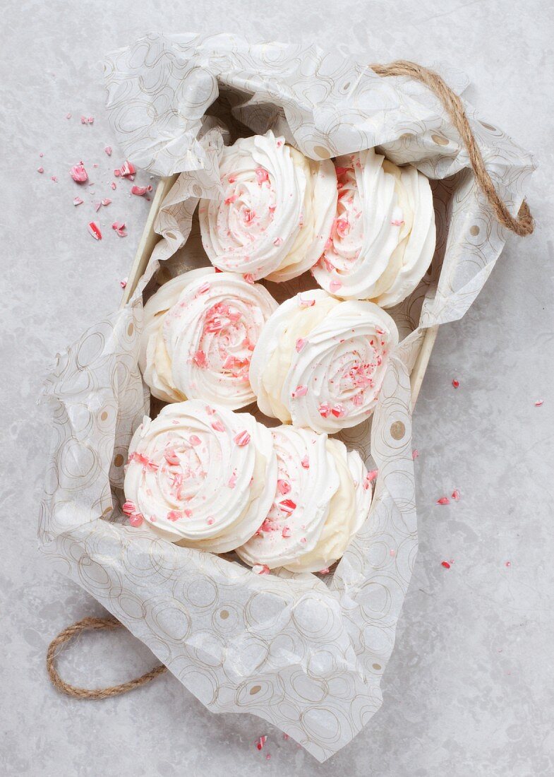 A box of Candy Cane Peppermint Meringue Sandwiches