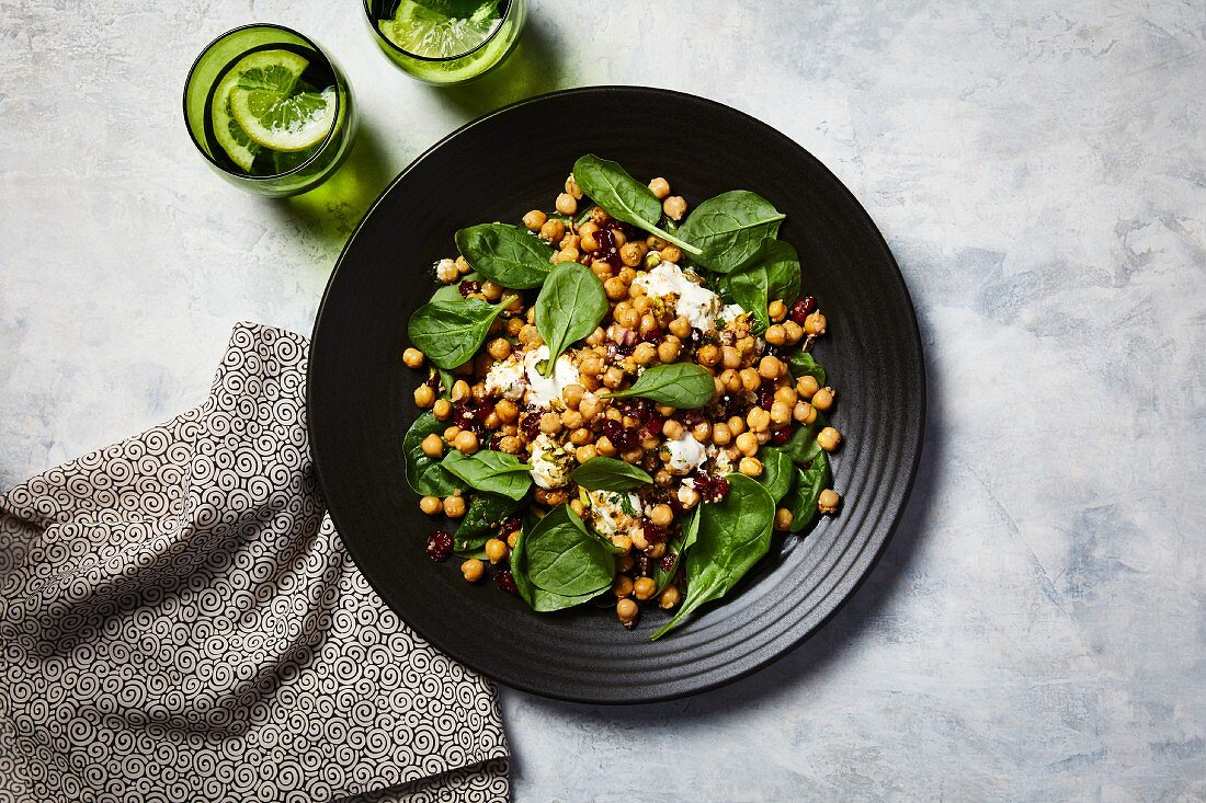 Quinoa chickpea salad with spinach cranberries