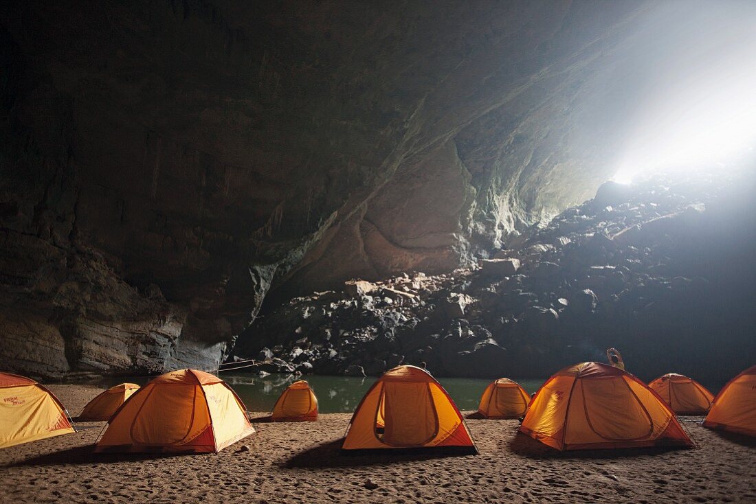 Expedition: tents in the Hang En cave in the Phong Nha-Ke Bang National Park in Vietnam
