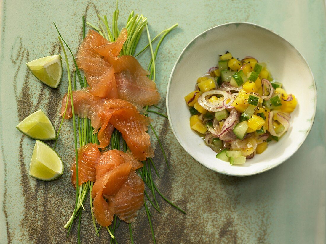 Smoked salmon with a cucumber and mango salad