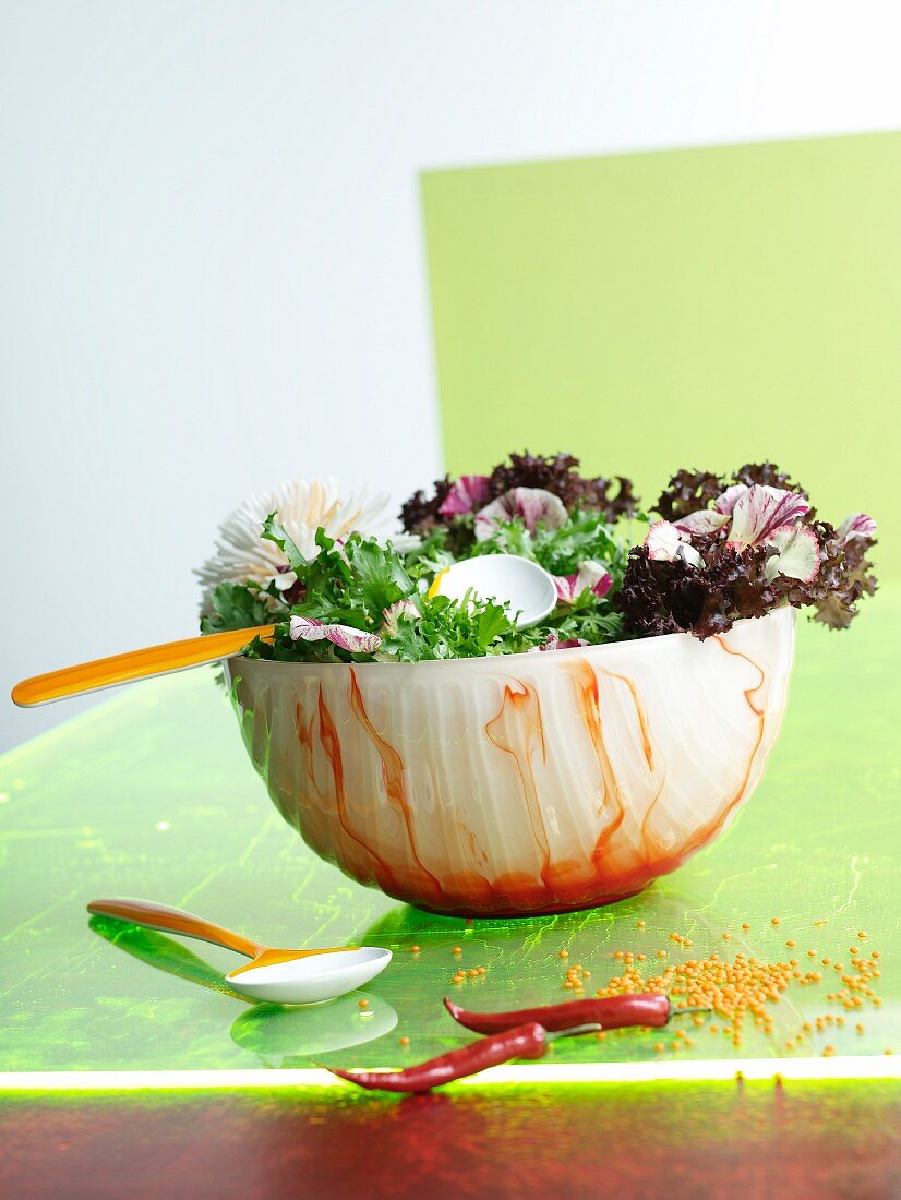 Mixed salad leaves in an artistic salad bowl