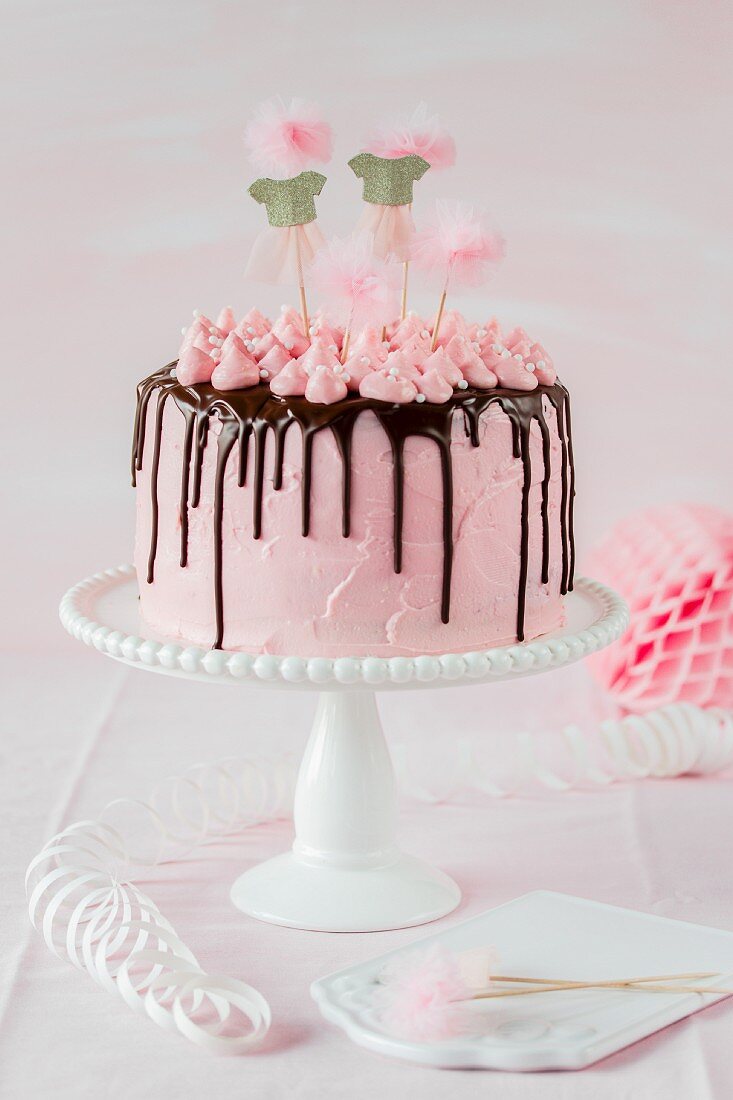 A pink girl's cake for a children's party