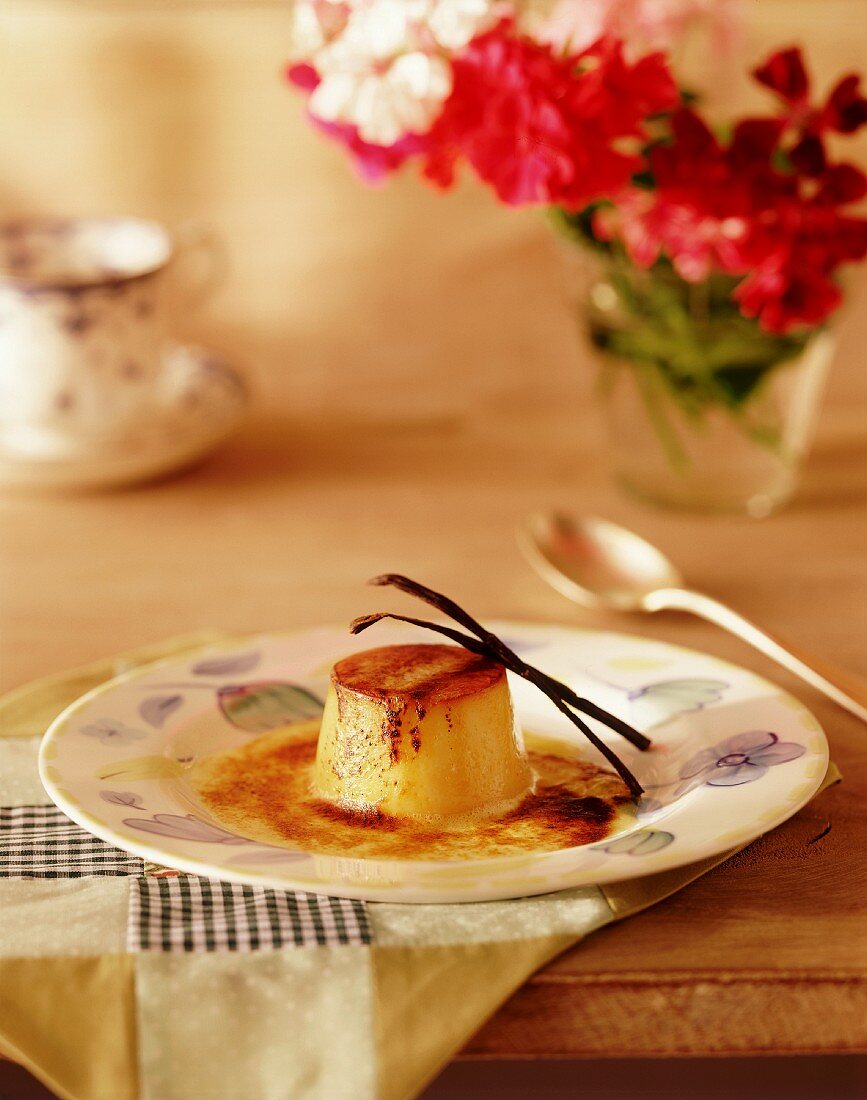 Individual vanilla pudding on a rustic country table