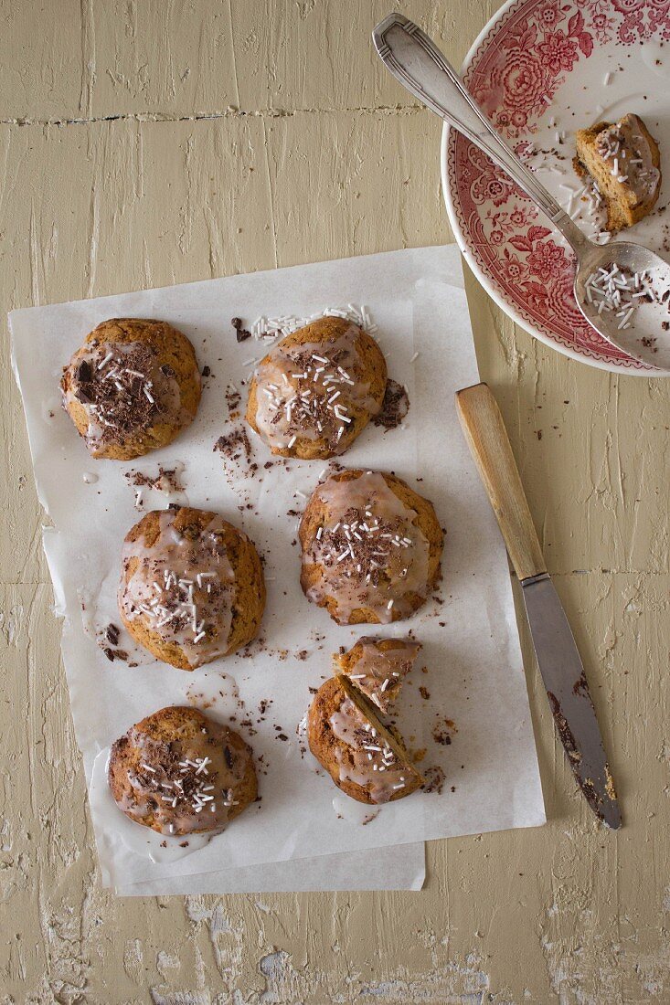 Glazed cookies with coconut shavings