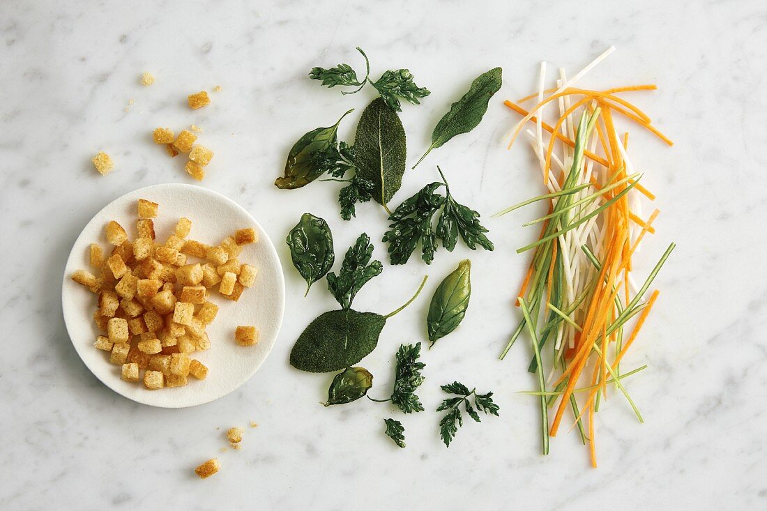 Toppings for soups: croutons, fried herbs and julienne-cut vegetables