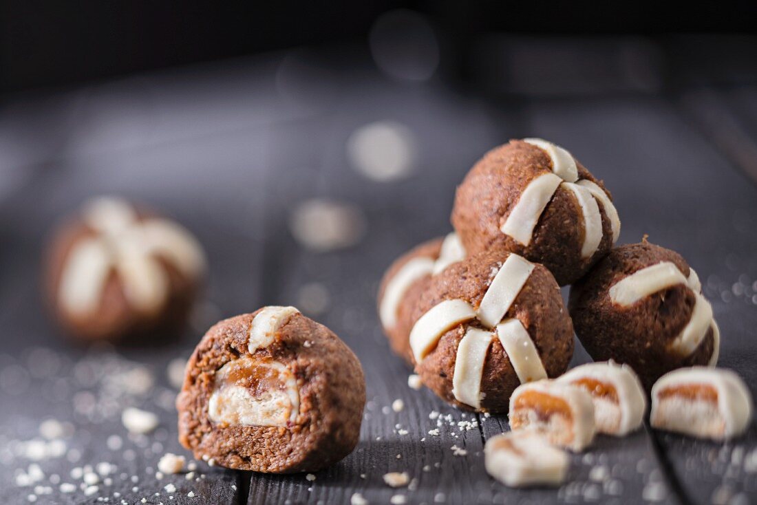 Pastry balls with marzipan and chocolate and caramel biscuit bars