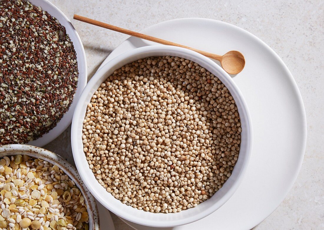 Sorghum, linseed and lentils in bowls