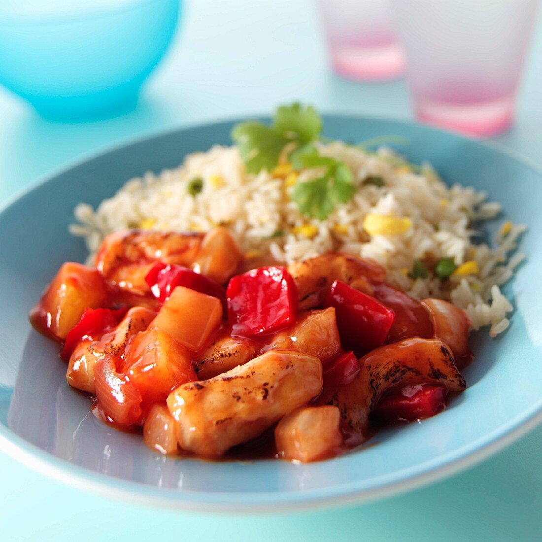 A bowl of sweet and sour chicken