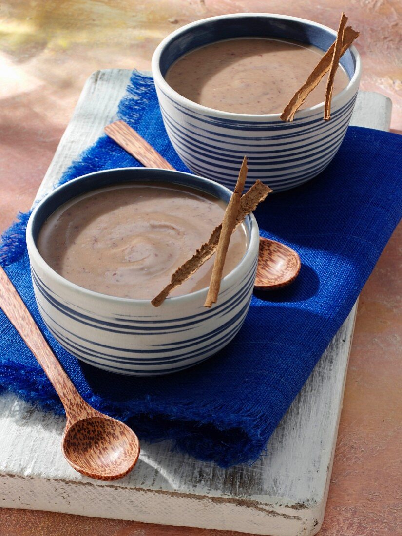 Two bowls of habichuelas con dulce caribbean soup editorial food