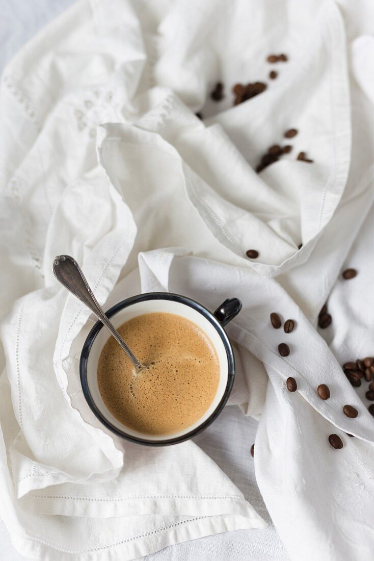 Coffee cup and coffee beans