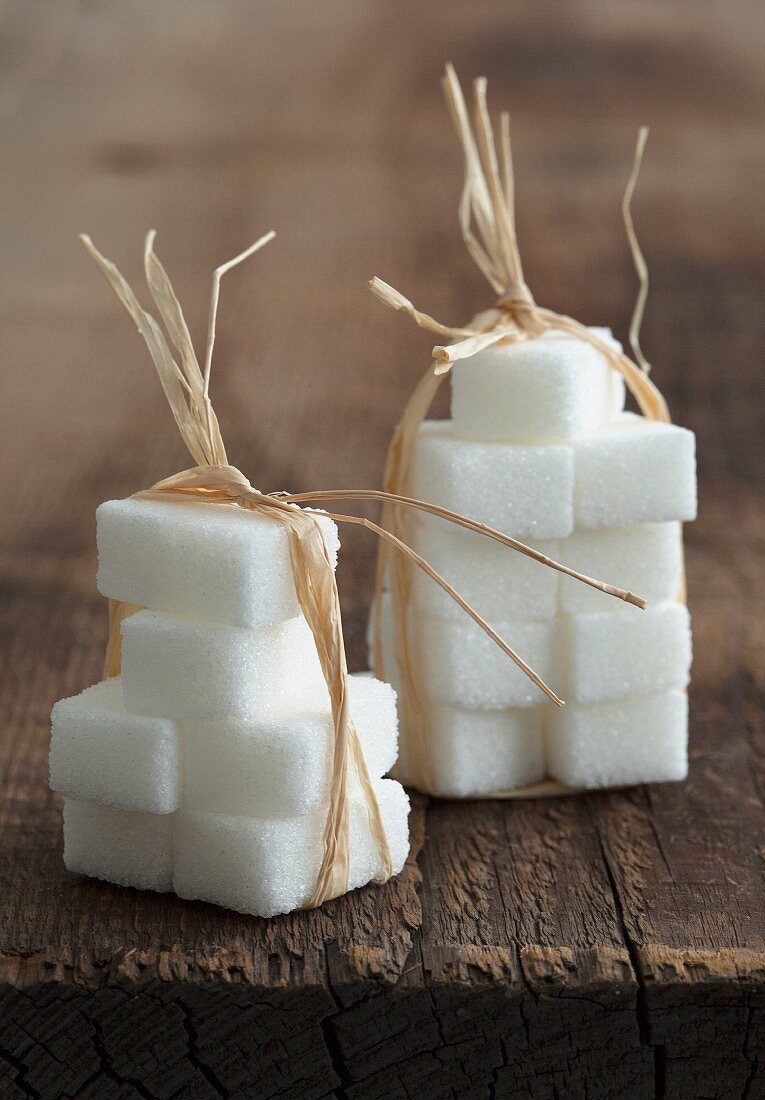 Sugar cubes tied together with raffia ribbon