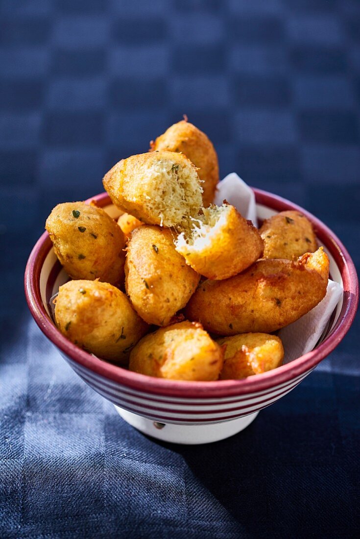Cod beignets in a bowl