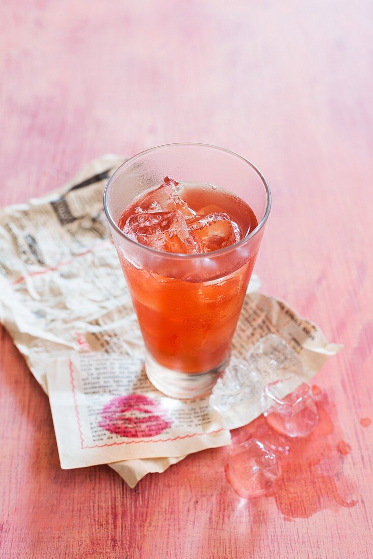 Campari in a glass with ice cubes