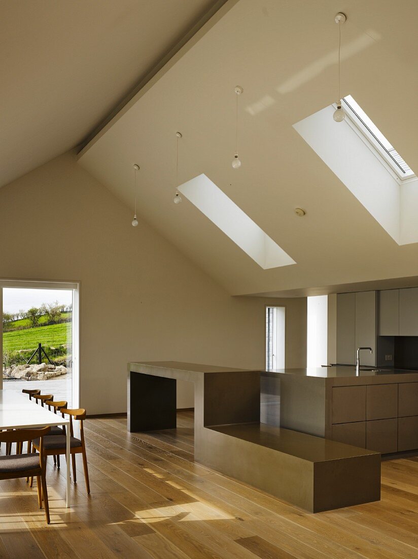 Open-plan kitchen in minimalist interior