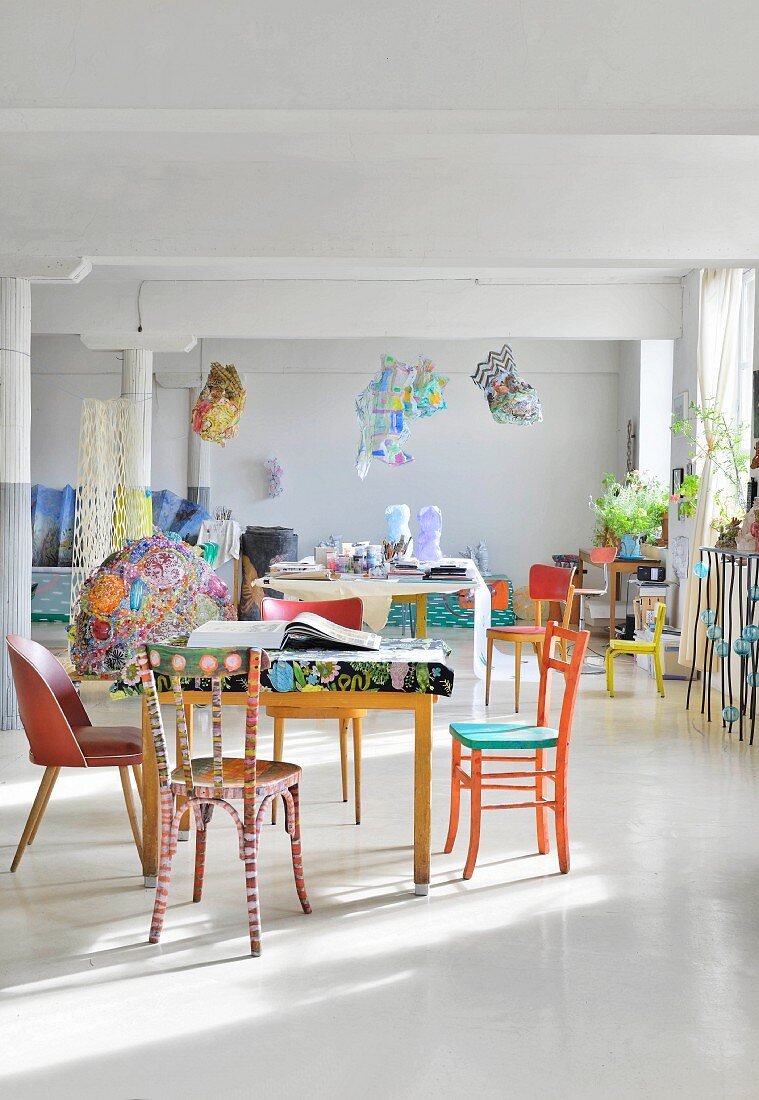 Columns and colourful eclectic furnishings