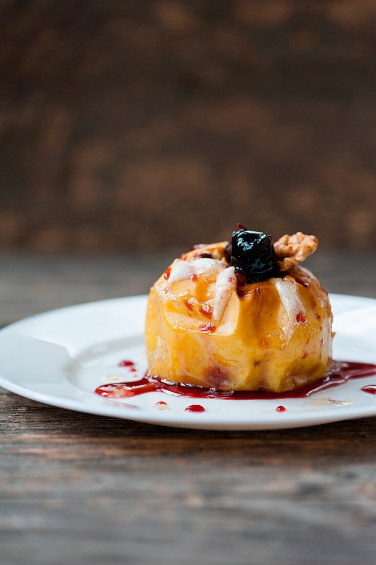 Baked apples for Christmas with nuts honey and cinnamon