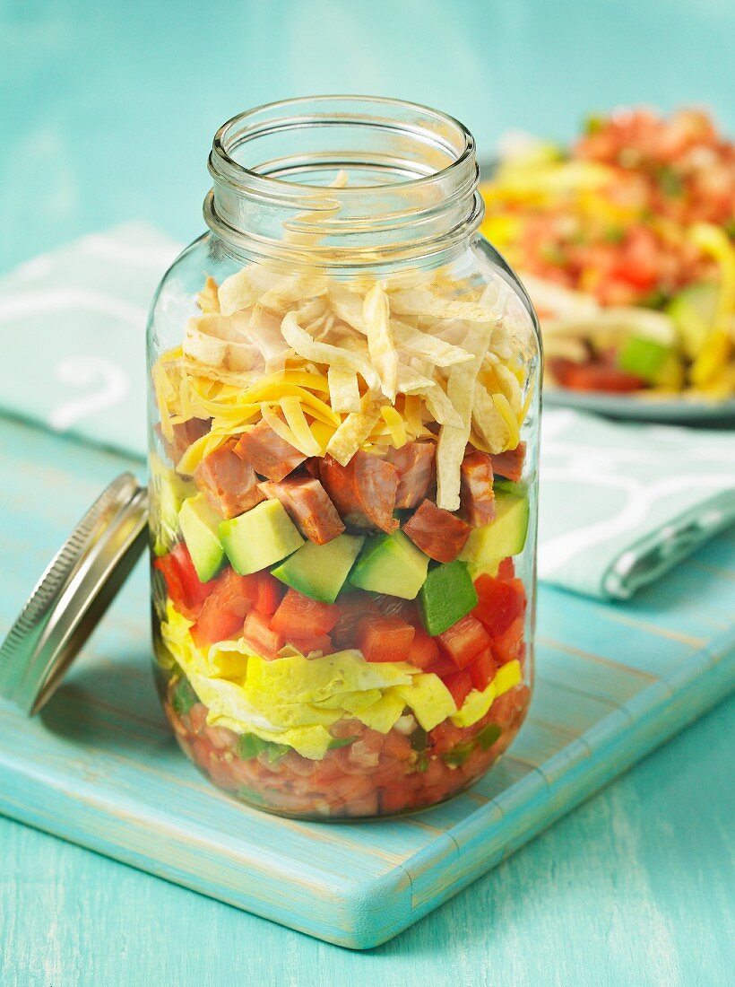 Breakfast burrito in a glass jar