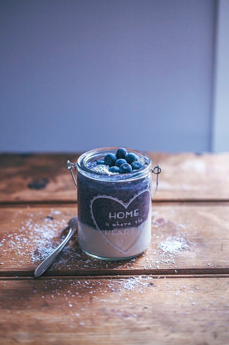 Soya yogurt and blueberry smoothie parfait in a jar