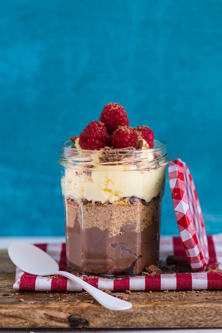 Meal in a Jar: Dark Chocolate Cheesecake topped with Crushed Biscuits and Cacao Nibs and White Choc Cream