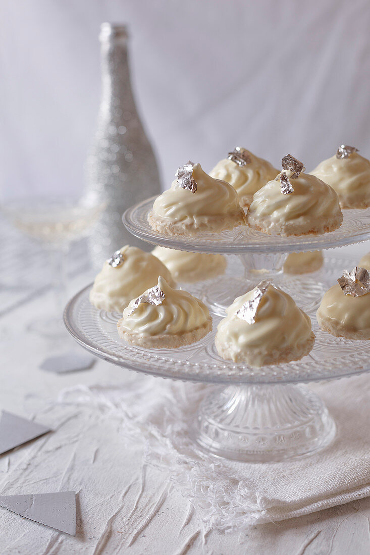 White chocolate sweets on a cake stand