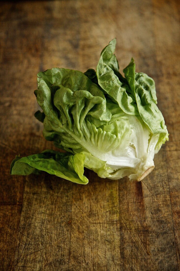 Iceberg lettuce and a rustic country table