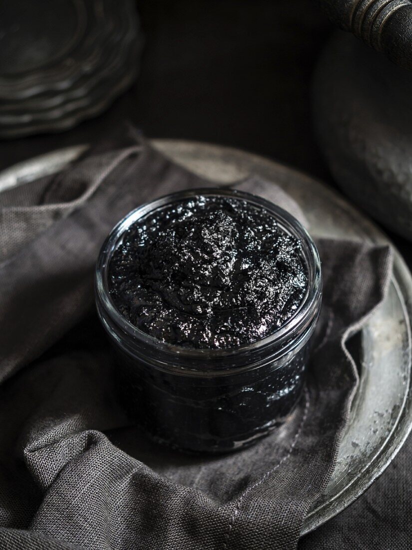 Raw organic black tahina (made from black sesame seeds)