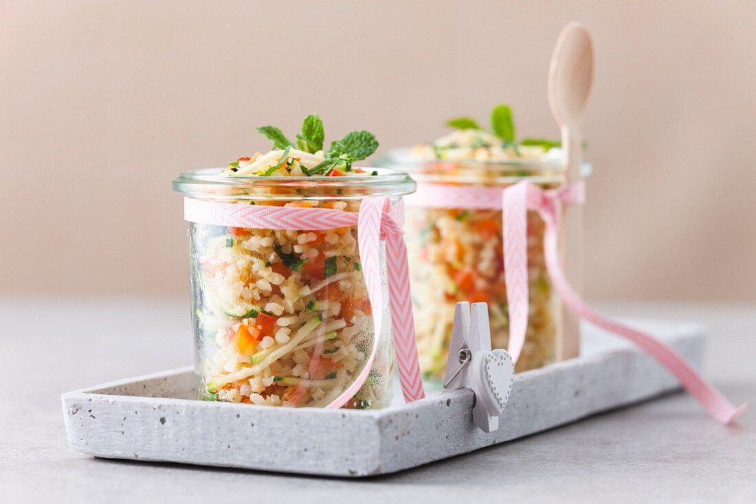 Mixed grain and vegetable salad in a glass