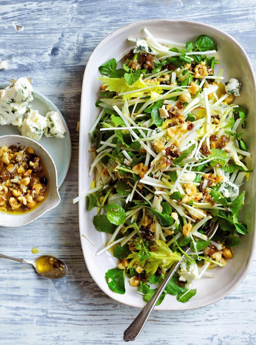 Apple, celery and Roquefort salad with roasted hazelnut-raisins