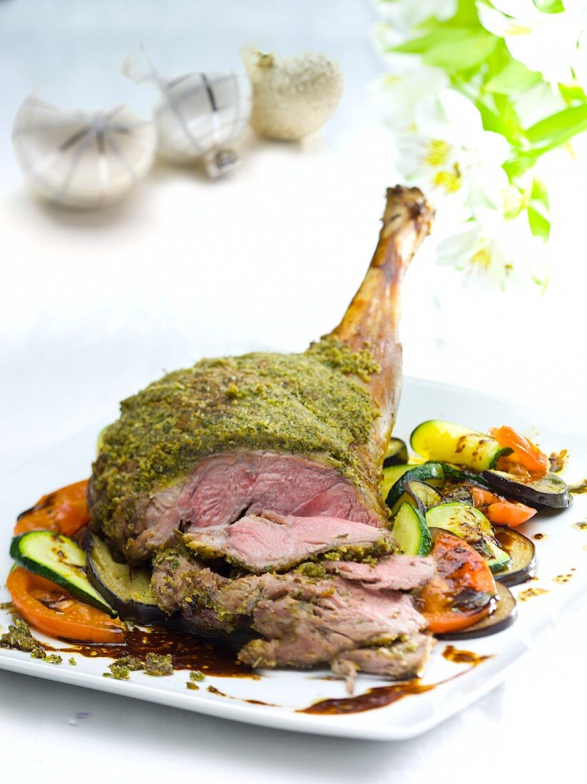 Roast lamb with a herb crust and grilled vegetables