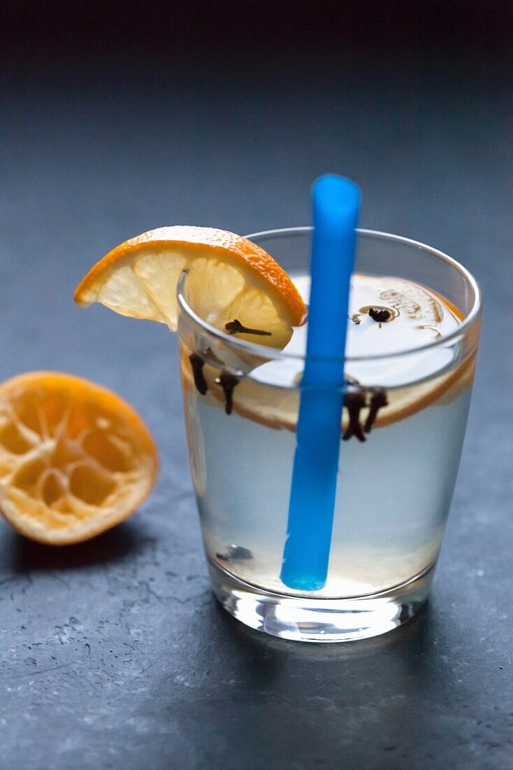 Lemonade in a glass with orange slices