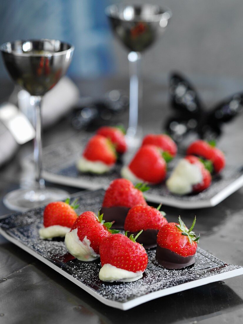Strawberries dipped in white and dark chocolate