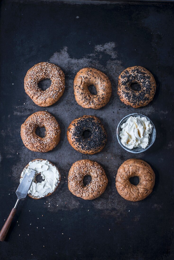 Spelt bagels with white and black sesame and fresh cheese
