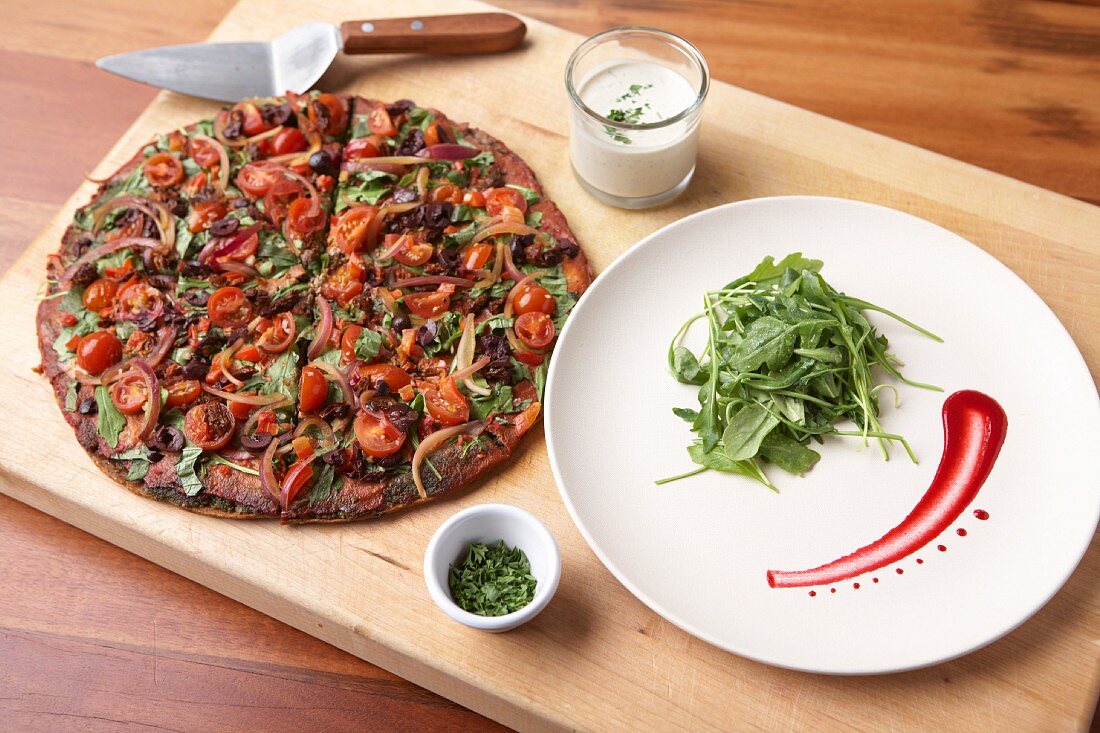 Vegetable pizza with cherry tomatoes