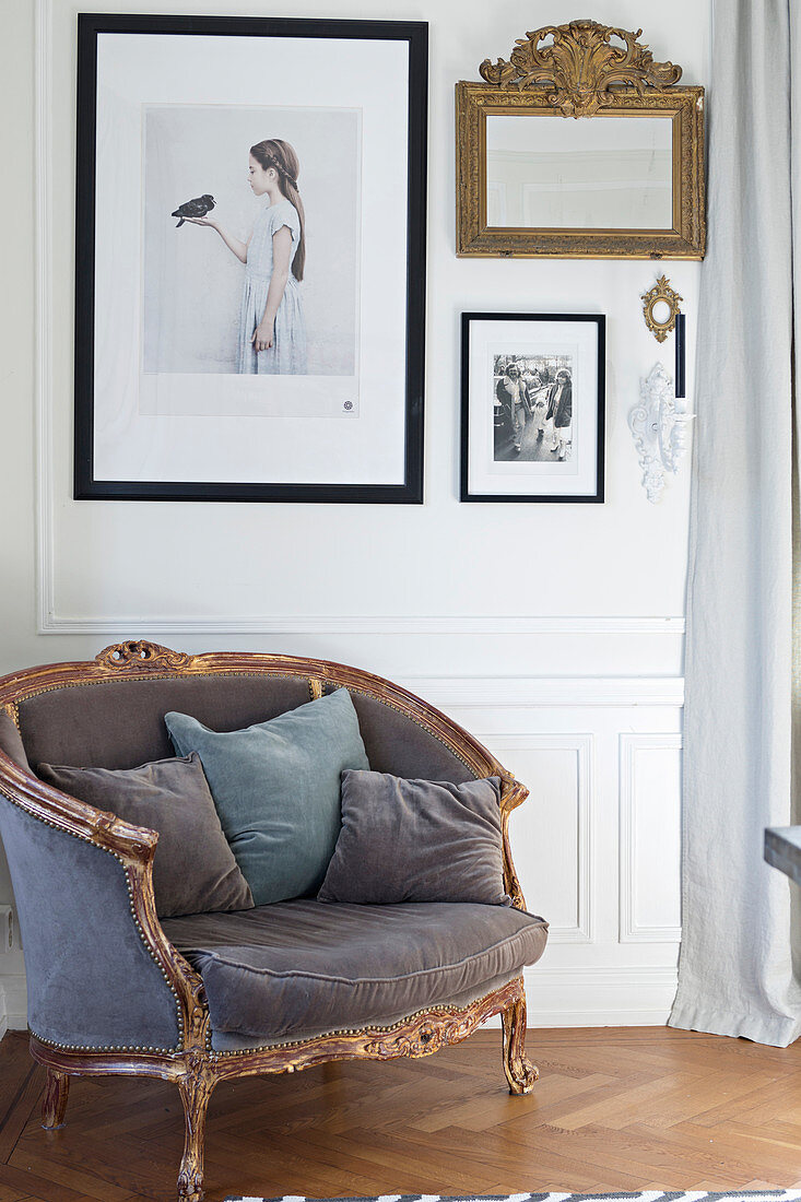 Baroque armchair with velvet upholstery against panelled wall