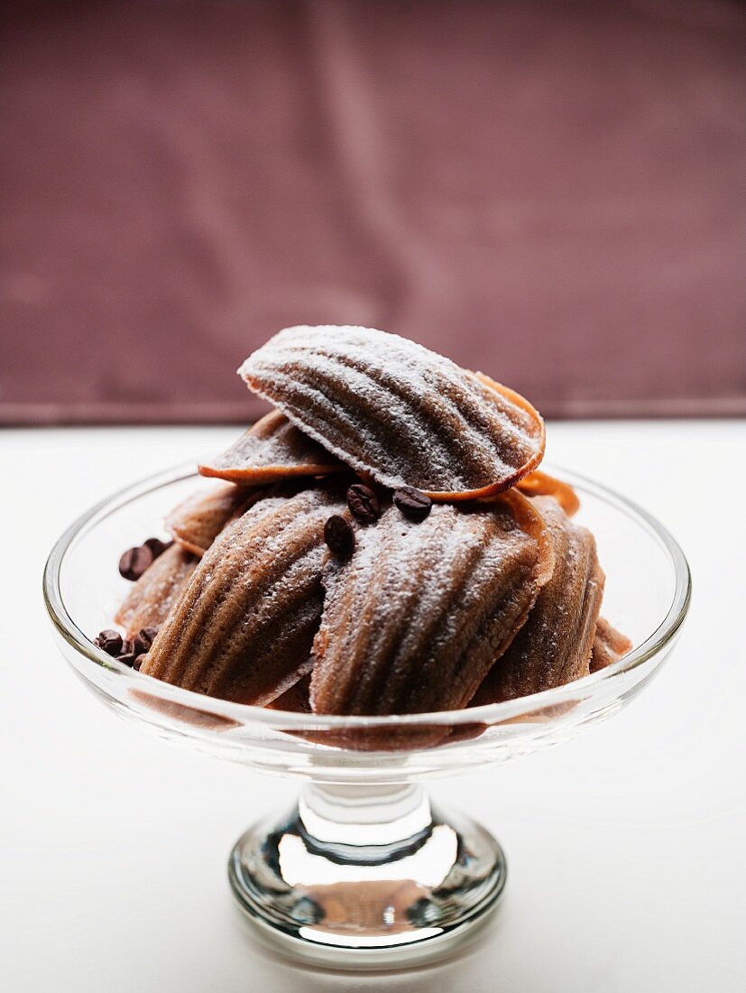 Mocha madeleines in a glass bowl
