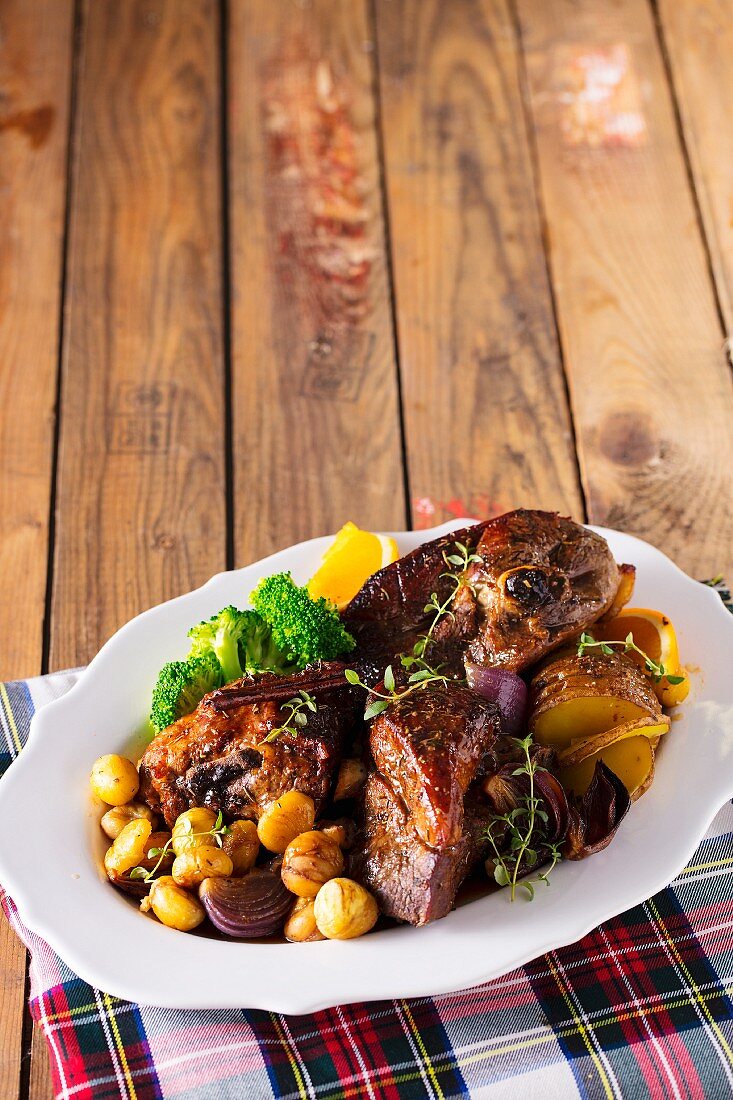 Lamb with chestnuts, potatoes and broccoli