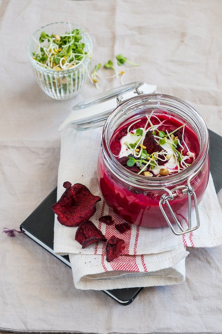 Beetroot cream soup in a glass jar