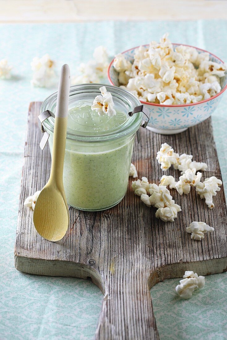 Soup in a glass with popcorn