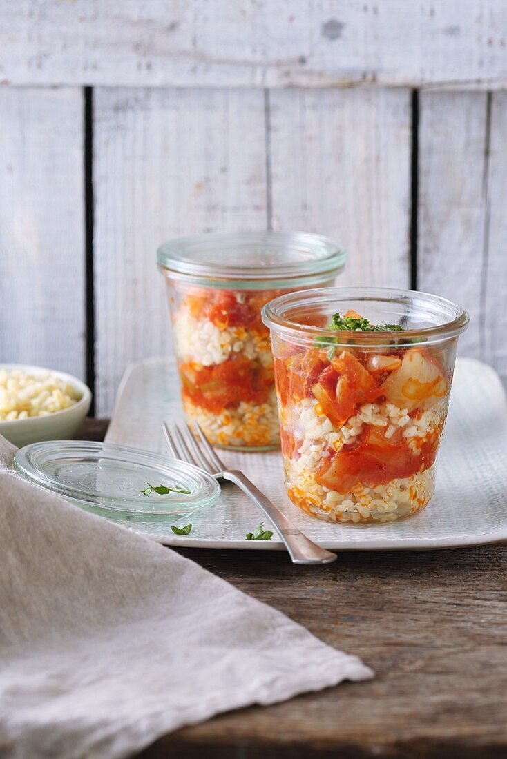 Bulgur wheat with Letscho (peppers in tomato sauce) in glass jars