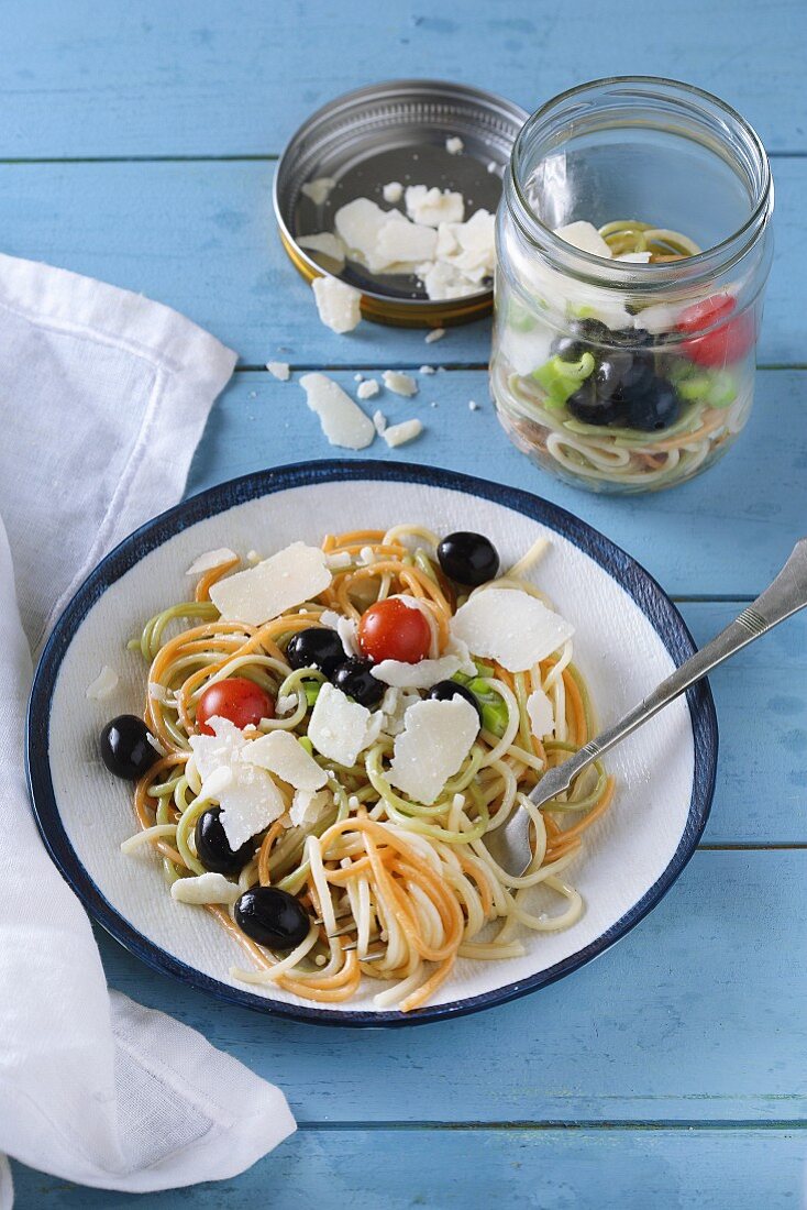 Noodle salad with olives, tomatoes and cheese for lunch