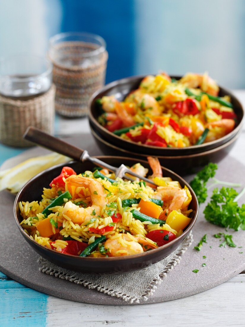 Saffron rice with giant prawns and vegetables