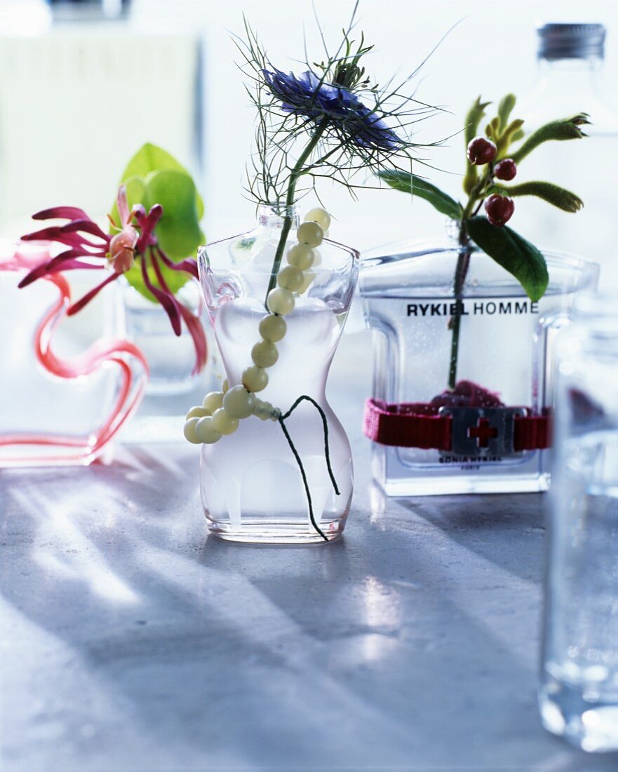 Old perfume bottles used as vases