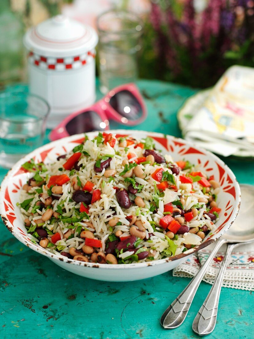 Summer rice salad with kidney beans, black eyed beans and peppers